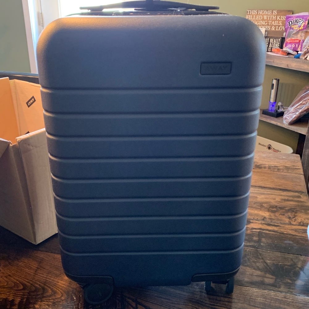 NWT Away kids carry on suitcase with battery- navy